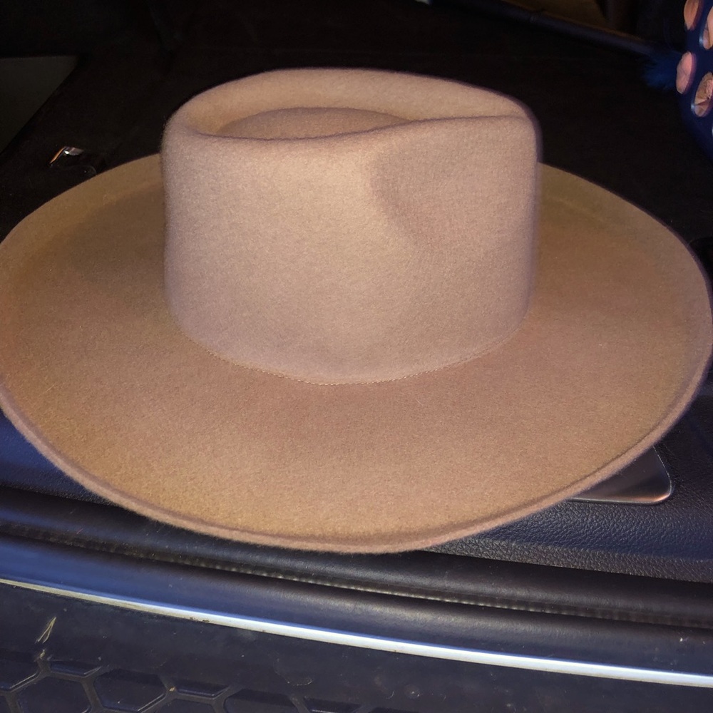 Light brown wide rimmed hat. From target I believe!